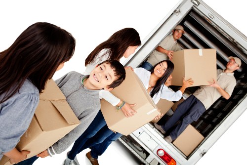 Local home moving service in Chalkfarm with packed boxes and furniture
