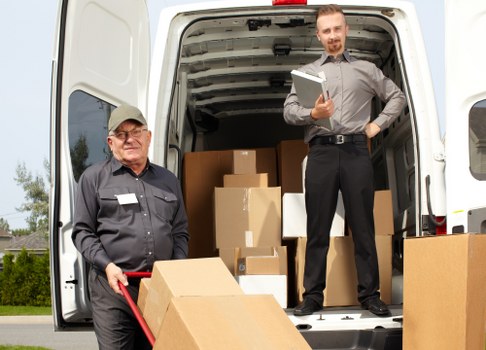 Man and van loading furniture in Chalkfarm street setting