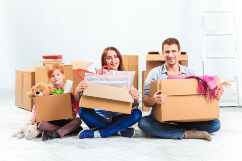 Packed boxes and furniture ready for local removal service