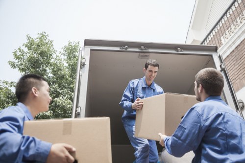 Worker reviewing safe lifting procedures