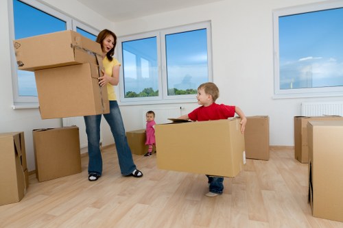 Loading furniture into a moving van in Chalkfarm