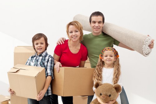 Boxes and furniture being assessed for load-based moving costs
