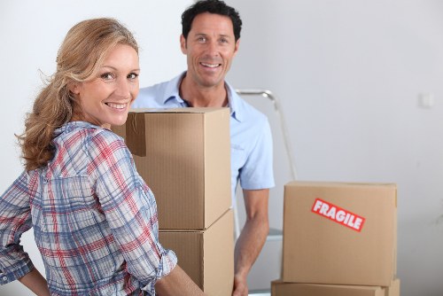 Residential moving assistance in Chalkfarm with boxes and furniture